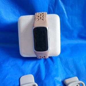 Fitbit Smartwatch with Pink Band